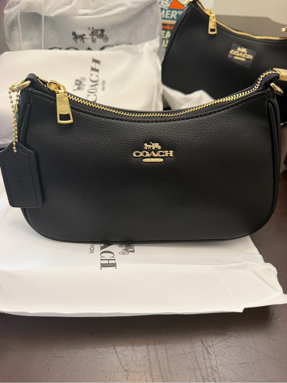 Coach Black Pebble Leather Crescent Shoulder Bag with Gold Hardware